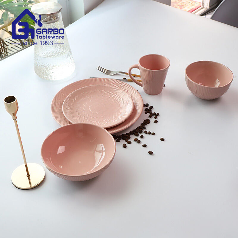 Elegant Dining Experience: Pink Glazed Stoneware Dinner Set with Embossed Designs from Garbo International