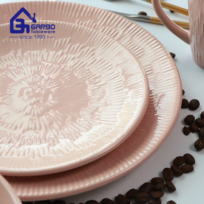 Elegant Dining Experience: Pink Glazed Stoneware Dinner Set with Embossed Designs from Garbo International