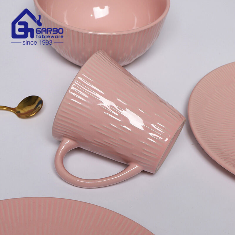 Elegant Dining Experience: Pink Glazed Stoneware Dinner Set with Embossed Designs from Garbo International